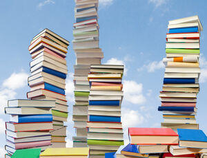 A stack of books | Veolia cross border education initiative