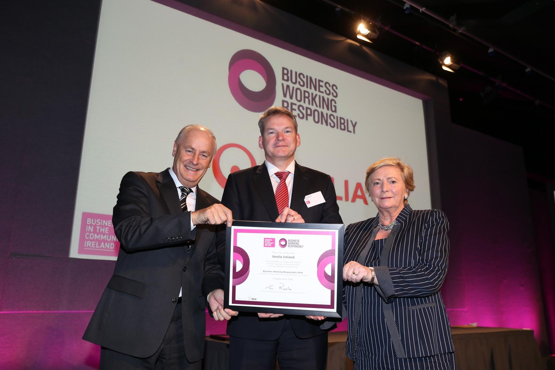 Niall Gleeson, Veolia Ireland, receives the Responsible Business Mark from BITC Ireland